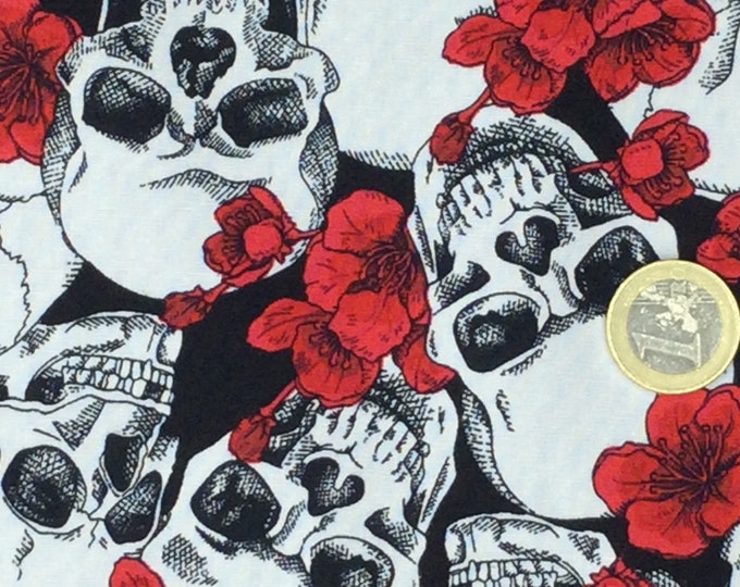 Cotton poplin with skulls, guns and roses