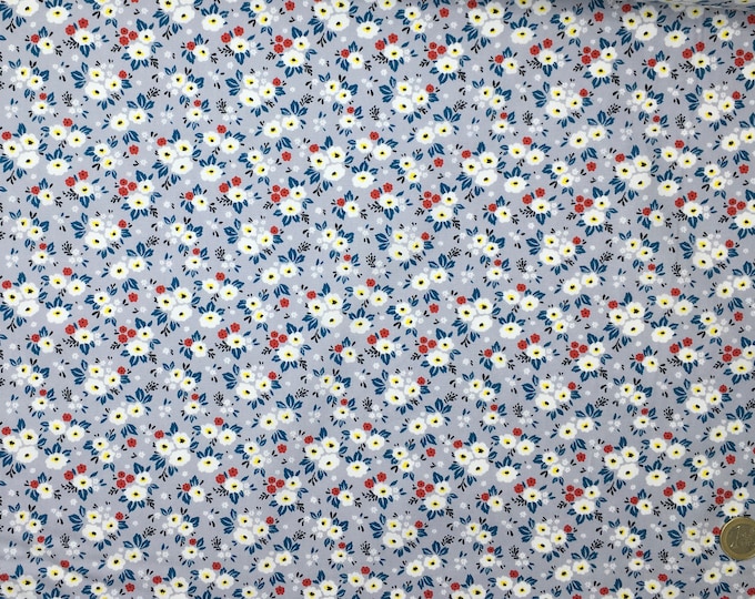 Cotton poplin with Fifties floral on silver Grey