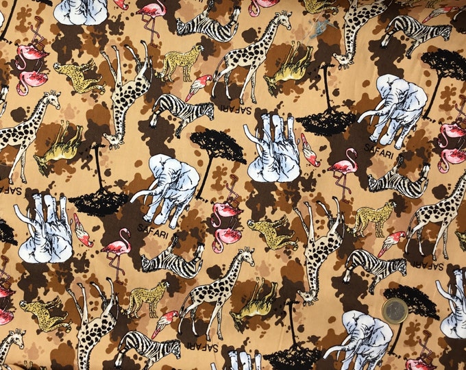 Cotton poplin with safari or Savannah print on light brown