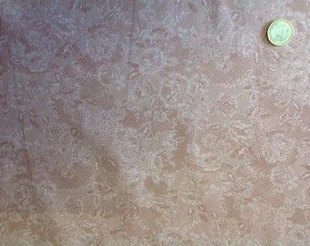Popeline de coton Oekotex, motif dentelle sur fond abricot tendre