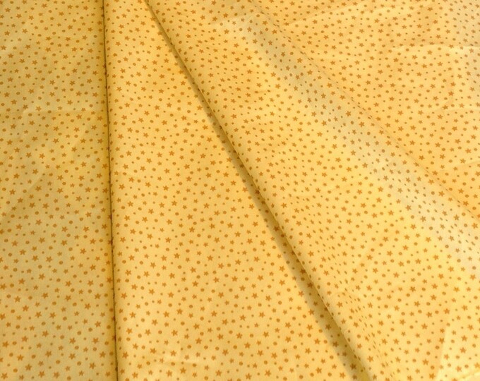 High quality cotton poplin, mustard stars on yellow