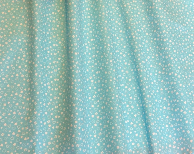 High quality cotton poplin, hearts and clover on light turquoise