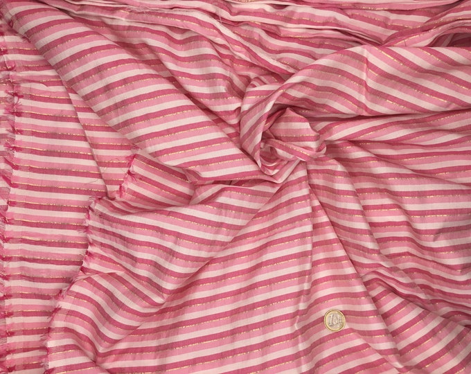 Indian hand made woven cotton fabric with metallic stripes.