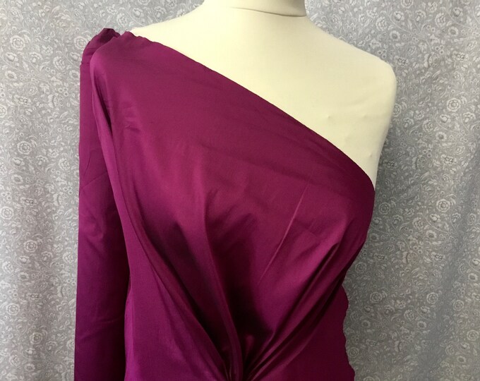 Two tone, iridescent faux dupioni taffetas silk fabric. Magenta/black nr36