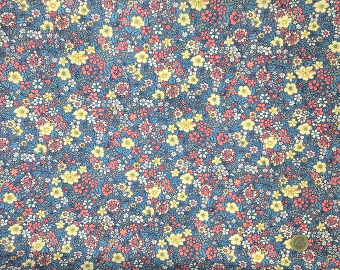 Oekotex coton poplin with floral or flowers on blue