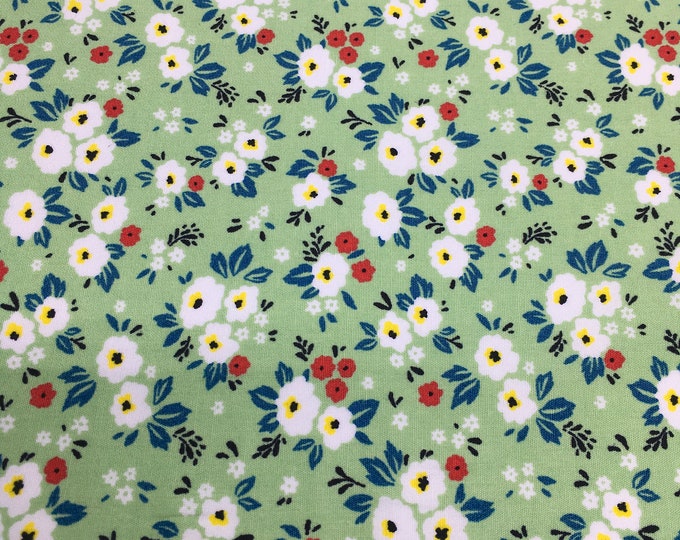 Cotton poplin with Fifties floral on vert