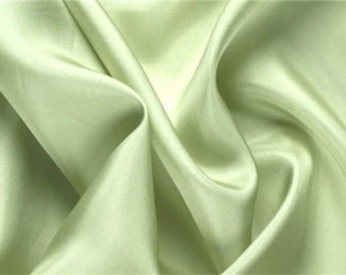 Faux silk satin fabric. Almond green