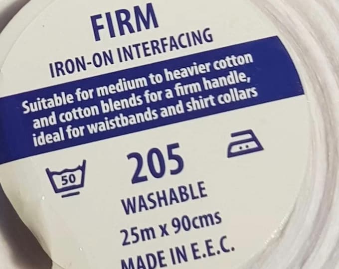 Firm, white iron on interfacing fabric
