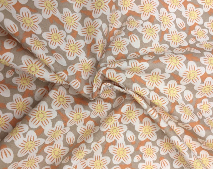 High quality cotton poplin, seventies floral print on dark beige