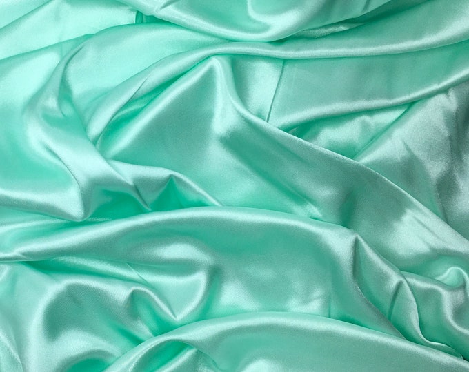 High quality silky satin back crepe, close to genuine silk crepe. Pastel green nr8