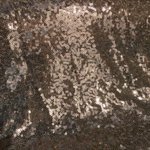 Light tulle dress fabric embroidered with small sequins, gold
