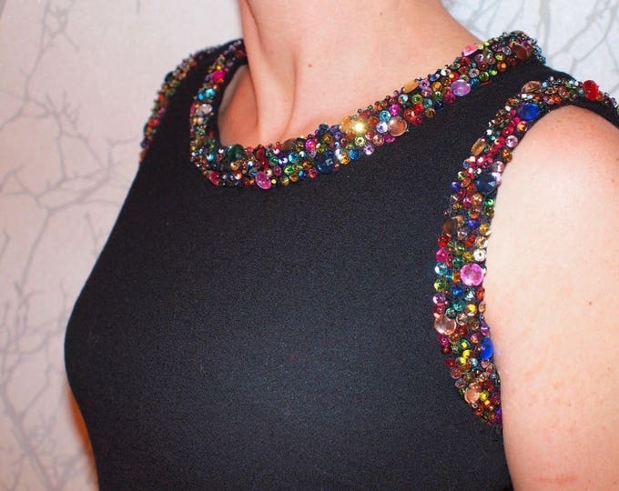 Black ribbon embroidered with multicolored beads and sequins, sold in 25cm lengths