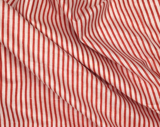 Indian block printed cotton muslin, hand made. Red stripes on off white.