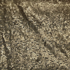 Light tulle dress fabric embroidered with small sequins, mat gold