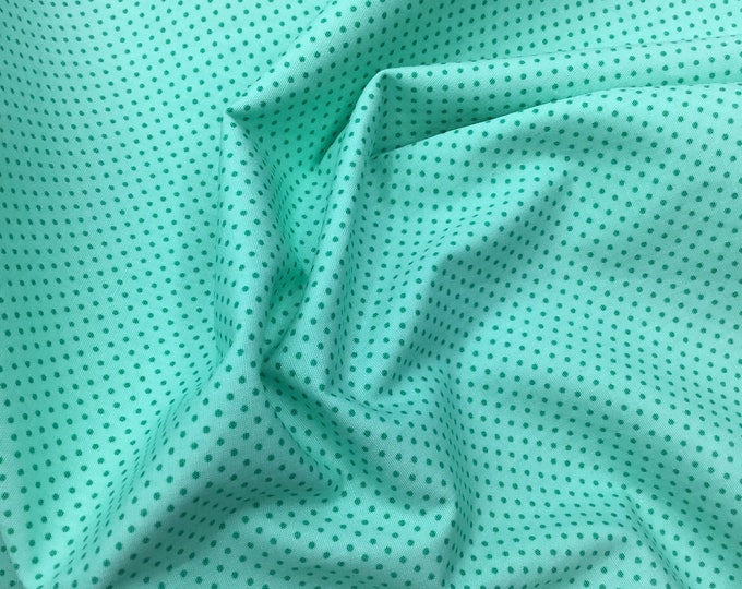 High quality cotton poplin. Green polka dots on pastel green nr27