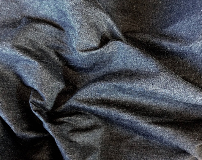 Thick chambray or very lightweight denim with a lovely softness after washing
