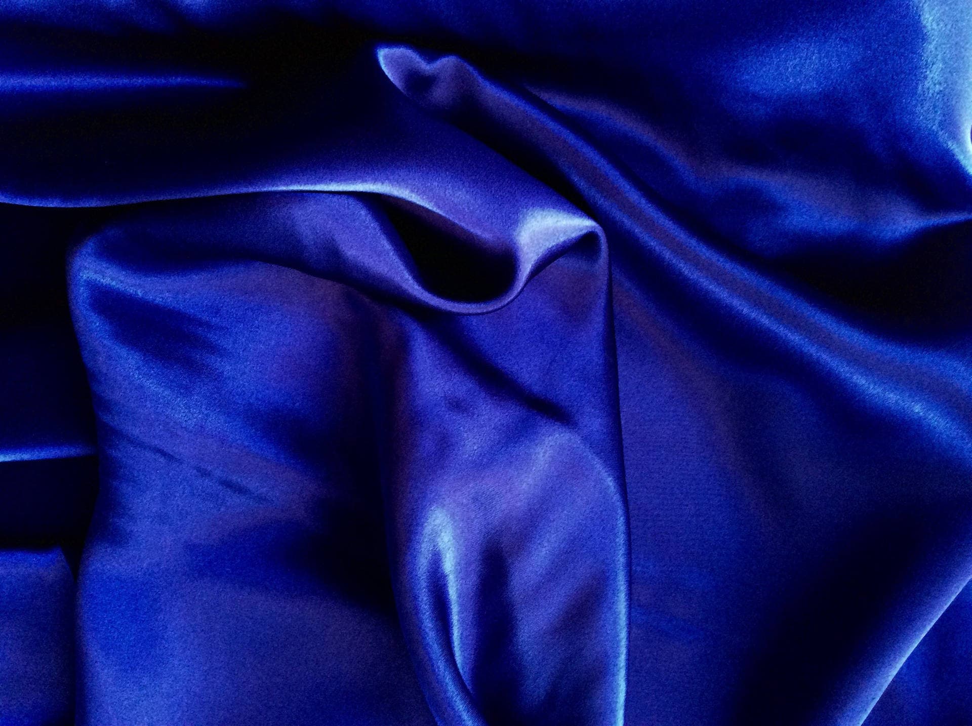 High quality silky satin, very close to genuine silk satin. Color