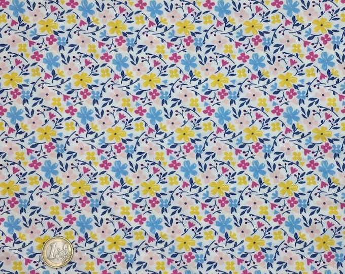 High quality cotton poplin dyed in Japan with yellow floral print
