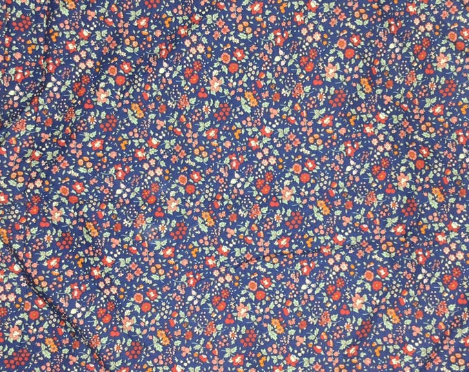 High quality cotton poplin dyed in Japan with floral on soft blue