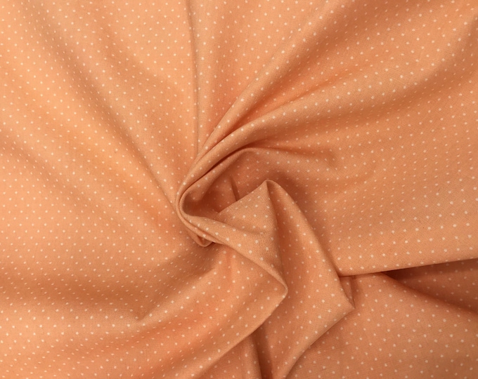 High quality cotton poplin, 1mm polka dots on apricot