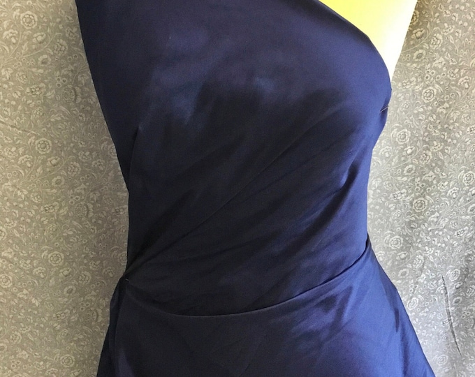 Two tone, iridescent faux dupioni taffetas silk fabric. Navy/black