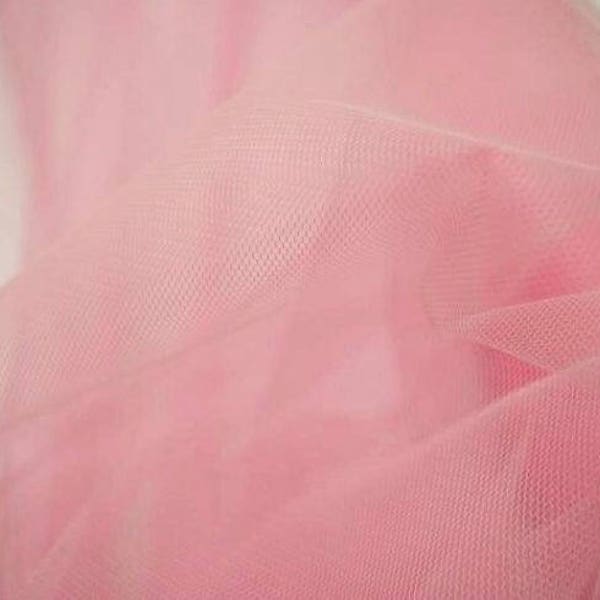 Tissu tulle rose rigide, parfait pour les jupons, la deco, les déguisements....