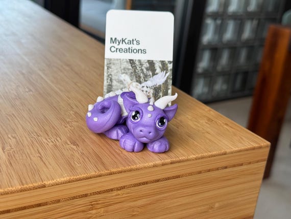 Purple baby dragon sculpture