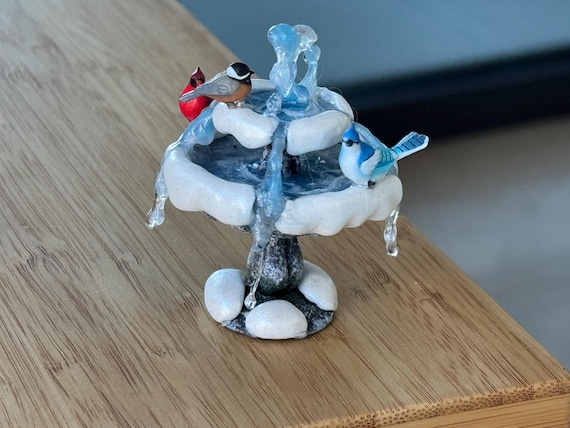 water fountain with birds