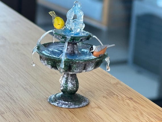 water fountain with birds