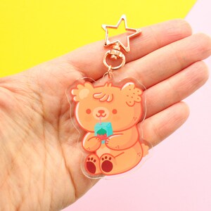 Paco The Bear drinking juice Acrylic Keychain, rose gold start shaped clip, bear character keychain 6 cm image 2