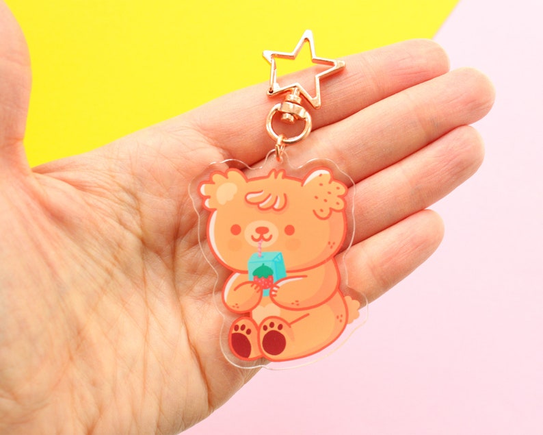 Paco The Bear drinking juice Acrylic Keychain, rose gold start shaped clip, bear character keychain 6 cm image 2
