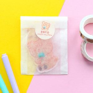 Paco The Bear drinking juice Acrylic Keychain, rose gold start shaped clip, bear character keychain 6 cm image 5