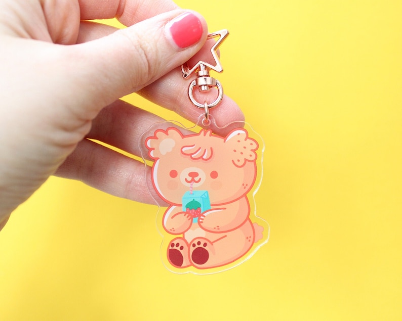 Paco The Bear drinking juice Acrylic Keychain, rose gold start shaped clip, bear character keychain 6 cm image 1