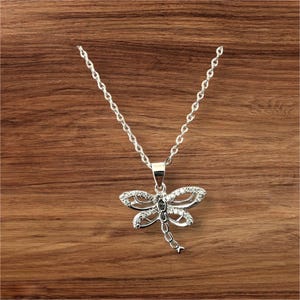 Handcast 925 Sterling Silver Dragonfly Pendant accented with Clear Cubic Zirconia + Free Chain