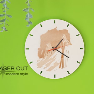 May include: White round clock with black hands and a woodgrain design of skiers on a mountain. The clock has black Roman numeral markings around the edge.