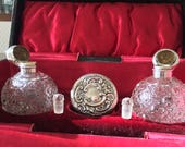 Antique Pair of Victorian Purfume bottles with silver moulded lids in the original box, Birmingham, Rare set