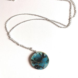 Collana lunga double face fiore ottanio