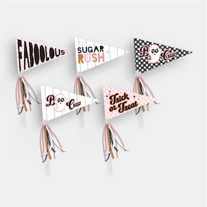 May include: Five pennant flags with black and white gingham and pink and white stripes. The flags have the following text: "Fabulous", "Sugar Rush", "Boo Crew", "Boo Crew", and "Trick or Treat".