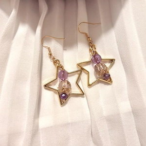 Xavier love and deepspace star dangle earrings