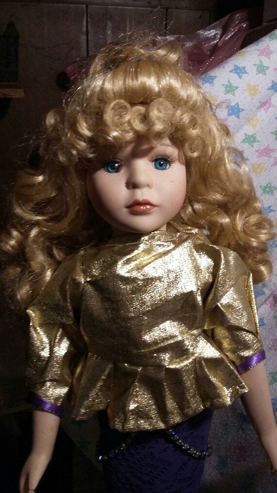 porcelain mermaid doll