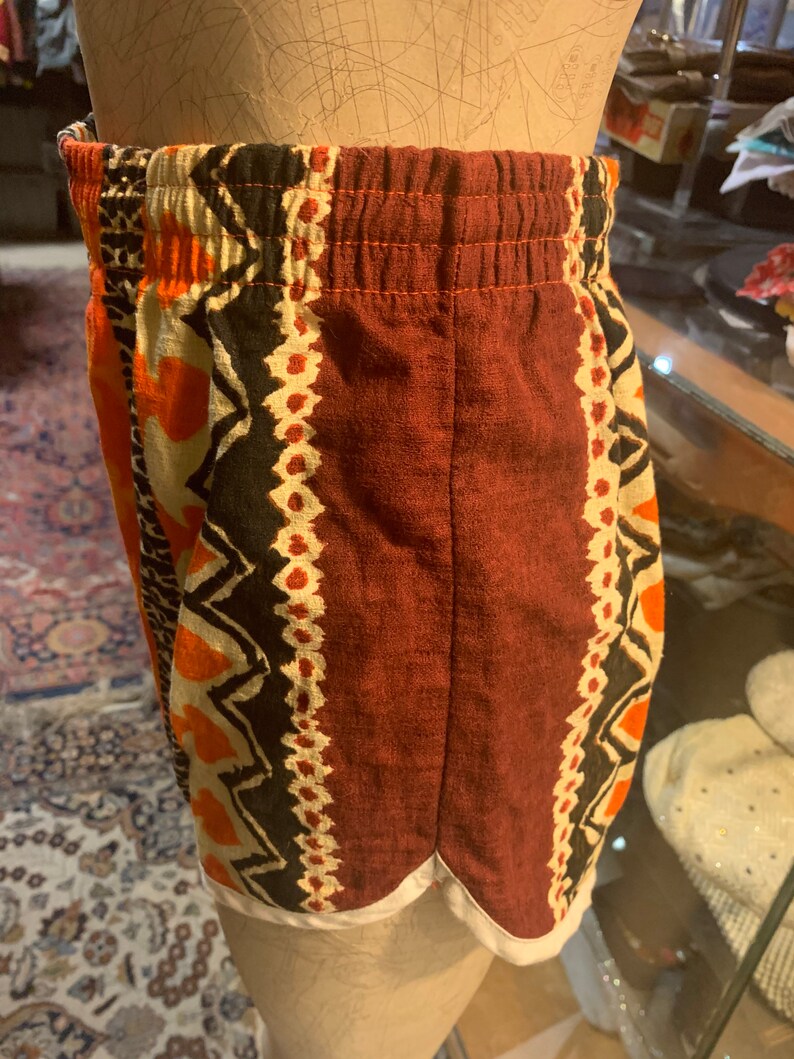 Cute Iil 1960s tiki style swim trunks!