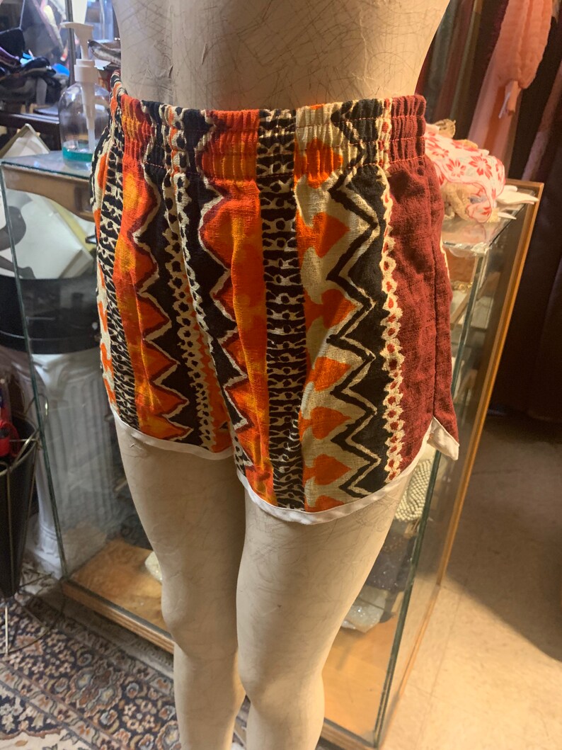Cute Iil 1960s tiki style swim trunks!