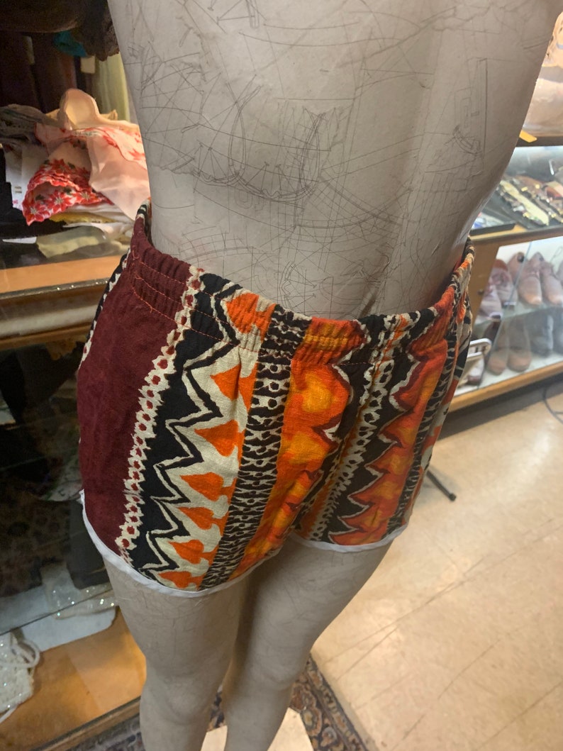 Cute Iil 1960s tiki style swim trunks!