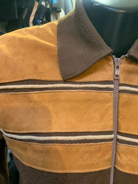 Snazzy sweater of the 1970s with suede chest detai