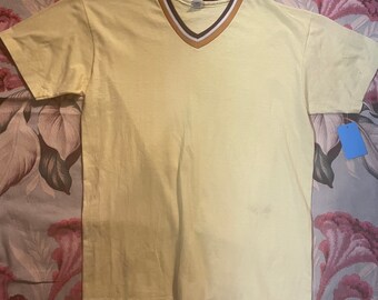 Cool 1980s tee in canary yellow!