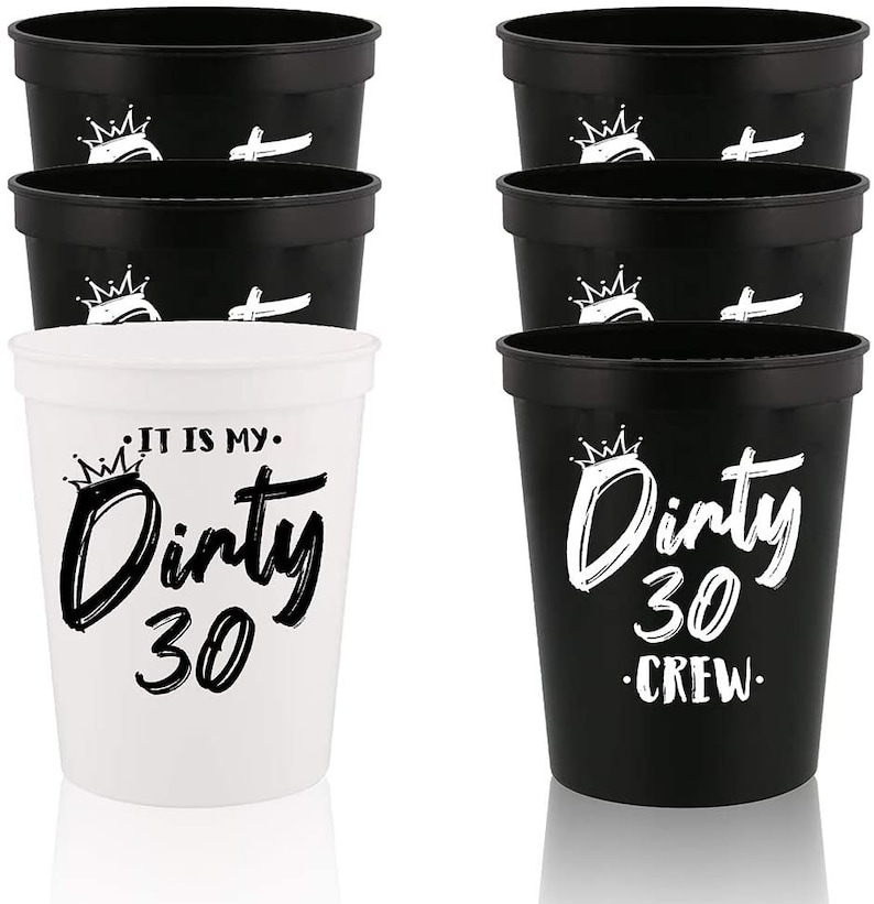 May include: Set of 8 black and white plastic cups with the text "Dirty 30" and a crown design.  Half of the cups say "It is my. Dirty 30" and the other half say "Dirty 30. Crew."