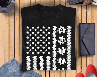 Camiseta con la bandera de EE. UU. para concienciar sobre el autismo: Diseño de rompecabezas de la amabilidad