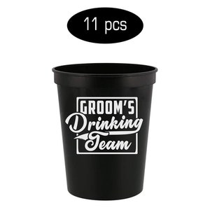 May include: A set of 11 black plastic cups with the text "Groom's Drinking Team" printed in white.