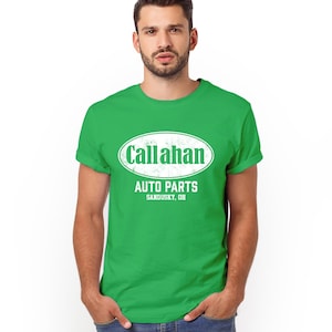 May include: A green t-shirt with a white distressed logo that reads "Callahan Auto Parts Sandusky, OH".
