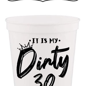 May include: White plastic cup with a black crown and the text "It is my Dirty 30" printed on it.